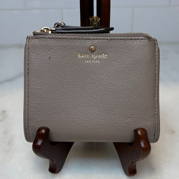 kate spade Handbags - Kate Spade Pebbled Leather Bi-Fold Wallet